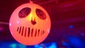 Glowing balloon inflatable ball featuring a cheerful skull