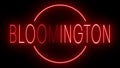 Glowing and blinking red retro neon sign for BLOOMINGTON