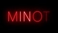 Glowing and blinking red retro neon sign for MINOT