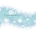 Glowing blue Christmas card with snowflakes and stars. Royalty Free Stock Photo