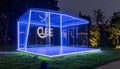 Illuminated Glass Cube Installation at Night Royalty Free Stock Photo