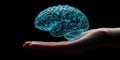 A glowing blue digital brain suspended above a human hand Royalty Free Stock Photo
