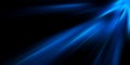 Glowing Blue light rays on a black abstract background Royalty Free Stock Photo