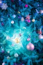 Glowing blue star decoration on Christmas tree - Abstract colors Royalty Free Stock Photo