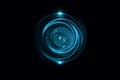 Glowing blue vortex with light ring on black backdrop, abstract background Royalty Free Stock Photo