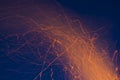 Glowing bonfire sparks and trails Royalty Free Stock Photo