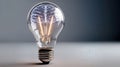 Generative AI Glowing Brain Inside Light Bulb on Grey Background Symbolizing Innovation and Creative Thinking for Royalty Free Stock Photo