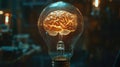 A glowing brain inside a light bulb symbolizes intellectual energy and creative thinking Royalty Free Stock Photo