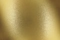 Glowing brushed bronze metal wall surface, abstract texture background Royalty Free Stock Photo