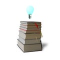 Glowing bulb on top of stack books Royalty Free Stock Photo