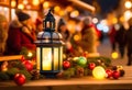 Glowing candle lantern and christmas decorations