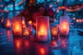 Glowing candlelight in blue surrounding with flower centerpiece on a wooden table