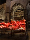 Glowing candles in cathedral