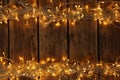 Glowing Christmas lights on wooden background. Space for text Royalty Free Stock Photo