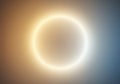 A glowing circular light is centered against a gradient background transitioning from Royalty Free Stock Photo