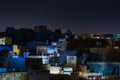 Glowing cityscape at Jodhpur by night. The majestic blue city perched on top. Scenic travel destination and famous tourist attract Royalty Free Stock Photo