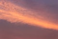 Glowing clouds on the red sky in evening light Royalty Free Stock Photo