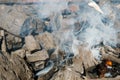 Glowing coals in a barbeque coal fire smoke Royalty Free Stock Photo