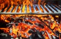 Glowing coals in a barbeque coal fire smoke Royalty Free Stock Photo