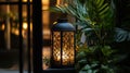 A glowing composition of a candlelit lantern styled beside fresh greenery. background Royalty Free Stock Photo
