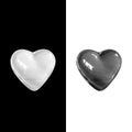 Glowing crystal white heart isolated on black background and black heart isolated on white background.