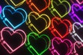 Glowing 3D Rendered Colorful Neon Heart Sign Over Black Background Royalty Free Stock Photo
