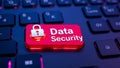 Glowing Data Security Red Key on Modern Keyboard Representing Cyber Defense Technology Royalty Free Stock Photo