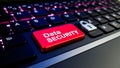 Glowing Data Security Red Key on Modern Keyboard Representing Cyber Defense Technology Royalty Free Stock Photo