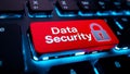 Glowing Data Security Red Key on Modern Keyboard Representing Cyber Defense Technology Royalty Free Stock Photo