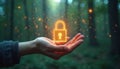 Glowing digital lock floating above hand. Cyber security, safe data protection. Forest background. Encryption technology secures Royalty Free Stock Photo