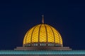 Glowing Dome and Minaret of Mosque at Night