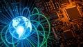 Glowing earth with orbit rings and light rays on circuit board Royalty Free Stock Photo