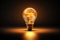 Glowing electric light bulb on dark background Royalty Free Stock Photo