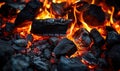 Glowing embers in a dark charcoal grill, capturing the intense heat of burning coals, ready for a barbecue under the night sky Royalty Free Stock Photo