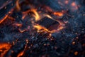 Glowing embers and floating ashes after fire, close up Royalty Free Stock Photo