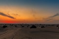 The glowing embers of the night sky after sunset in the desert outside Dubai, UAE Royalty Free Stock Photo