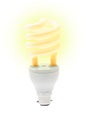 Glowing energy saving light bulb Royalty Free Stock Photo
