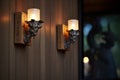 glowing exterior wall sconces in darkness