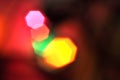 Glowing and festive colored light circles created from in camera and lens bokeh. Christmas fairy lights defocused giving a blurred Royalty Free Stock Photo