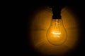 Glowing filament of an electric bulb Royalty Free Stock Photo