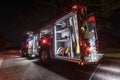 Glowing fire truck at night