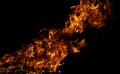 Glowing flames on black background. Inferno effect with flame. Flames with dramatic fire background. Burning flame. Intense Royalty Free Stock Photo