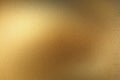 Glowing gold metallic thin sheet, abstract texture background Royalty Free Stock Photo