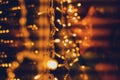 Glowing golden electric garlands, beautiful bright abstract celebration background and texture