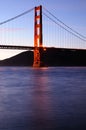 Glowing Golden Gate Bridge tower at sunset Royalty Free Stock Photo