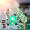 Glowing Green LED on an Electronic Circuit Board Royalty Free Stock Photo