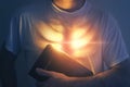 Glowing heart and Bible