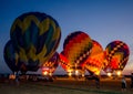 Glowing hot air balloons at night