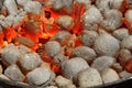 Glowing Hot Charcoal Briquettes Close-up Background Texture Royalty Free Stock Photo