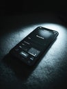 Glowing Interface of Focus Mode App in Dark Room Showcasing Its Features and Functionality During Nighttime Use Royalty Free Stock Photo